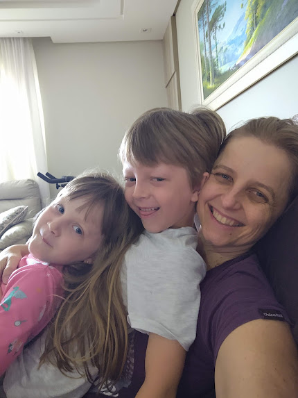 A picture of my two kids -- a boy and a girl -- and my wife.
